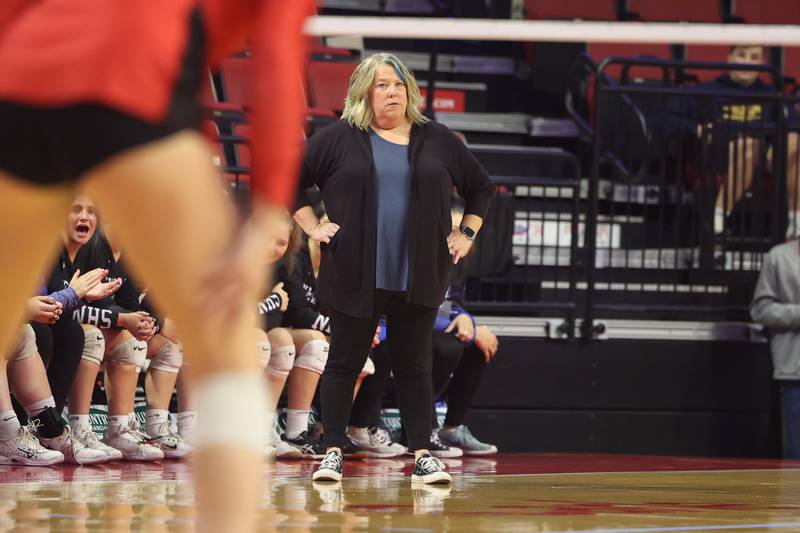 Newman head coach Debbi Kelly watches the match against Norris City-Omaha-Enfield in the Class 1A 3rd place match on Saturday in Normal.