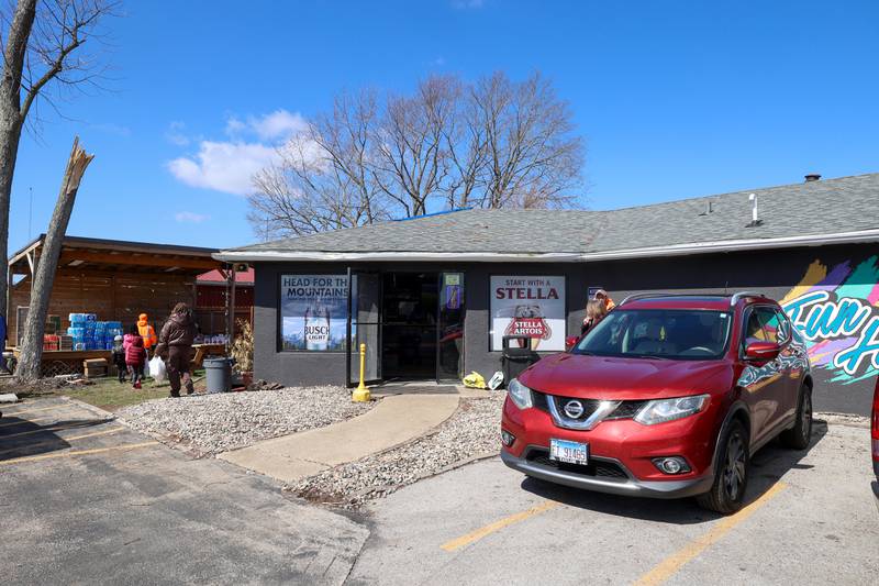 Residents come to collect supplies and a meal at the Fun Hub on March 12, 2026. The small bar transformed into a bustling hub of supplies, food and resources following the March 10 tornado that caused destruction in Aroma Township and across Kankakee County.