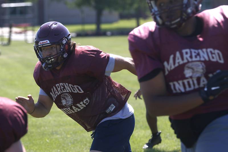 Marengo Hunter Smith runs a pursuit drill during summer football practice Monday, June 27, 2022, at Marengo Community High School in Marengo.