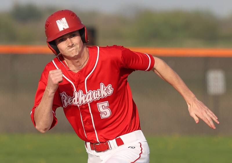 Naperville Central's Eli Jarrell heads to third Monday, April 28, 2025, during their game at DeKalb High School.