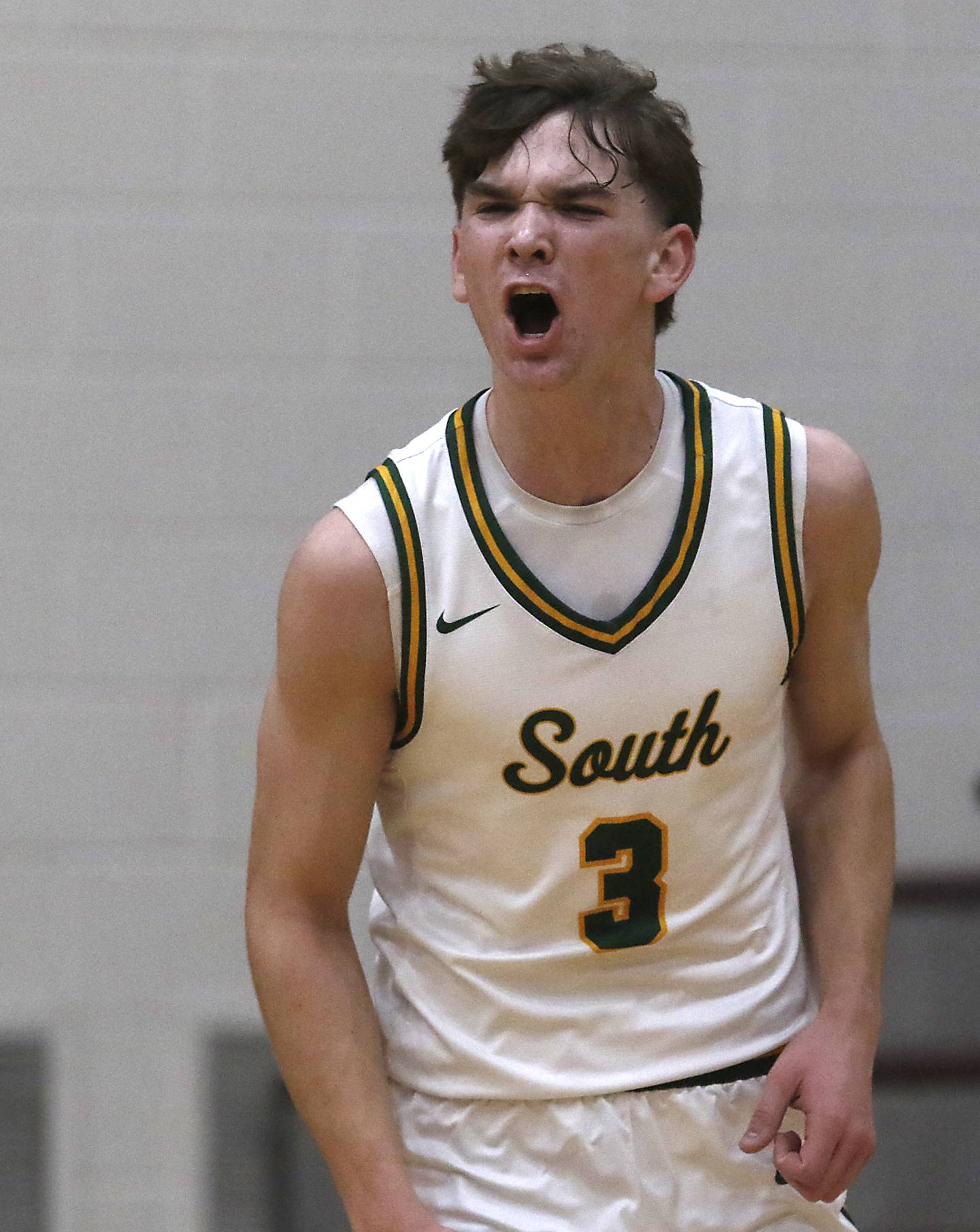Crystal Lake South's Nick Stowasser celebrates a three-point shot during the IHSA Class 3A Prairie Ridge Regional championship basketball game against Cary-Grove on Friday, Feb. 28, 2025, at Prairie Ridge High School in Crystal Lake.