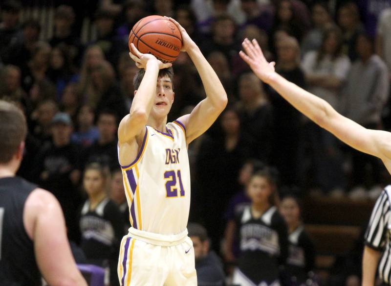Downers Grove North’s Jack Stanton shoots the ball during a game against Glenbard West at Downers Grove North on Friday, Jan. 13, 2023.