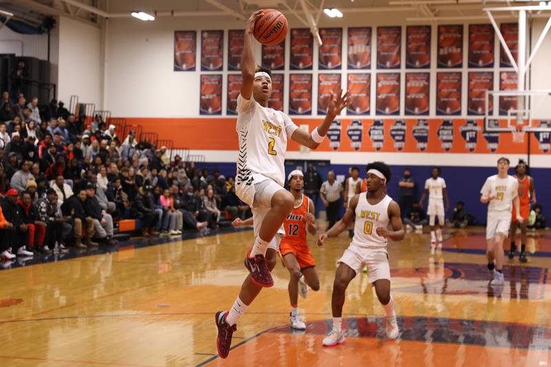 Joliet West’s Jeremiah Fears gets the breakaway layup against Romeoville on Tuesday January 31st, 2023.