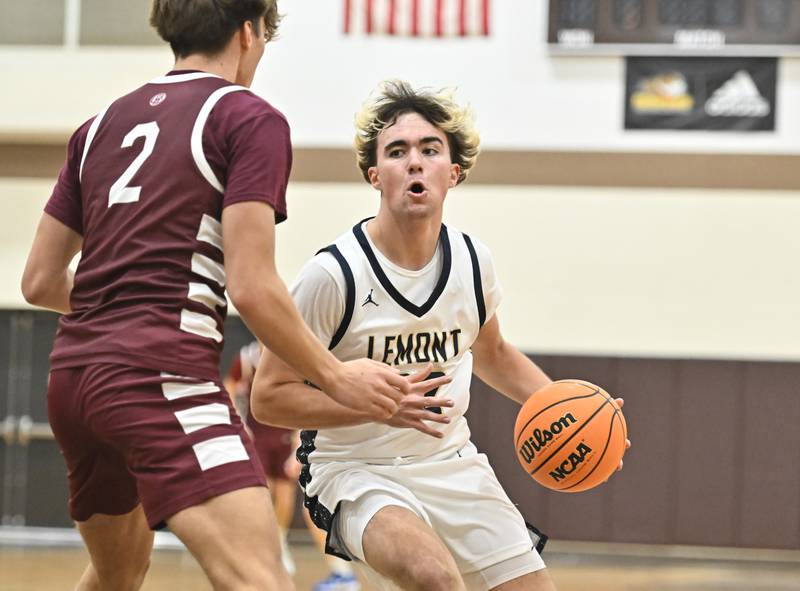 Lemont's Zane Schneider drives to the basket during the WJOL tournament championship game against Lockport on Saturday, NOV. 29, 2025, at Joliet.