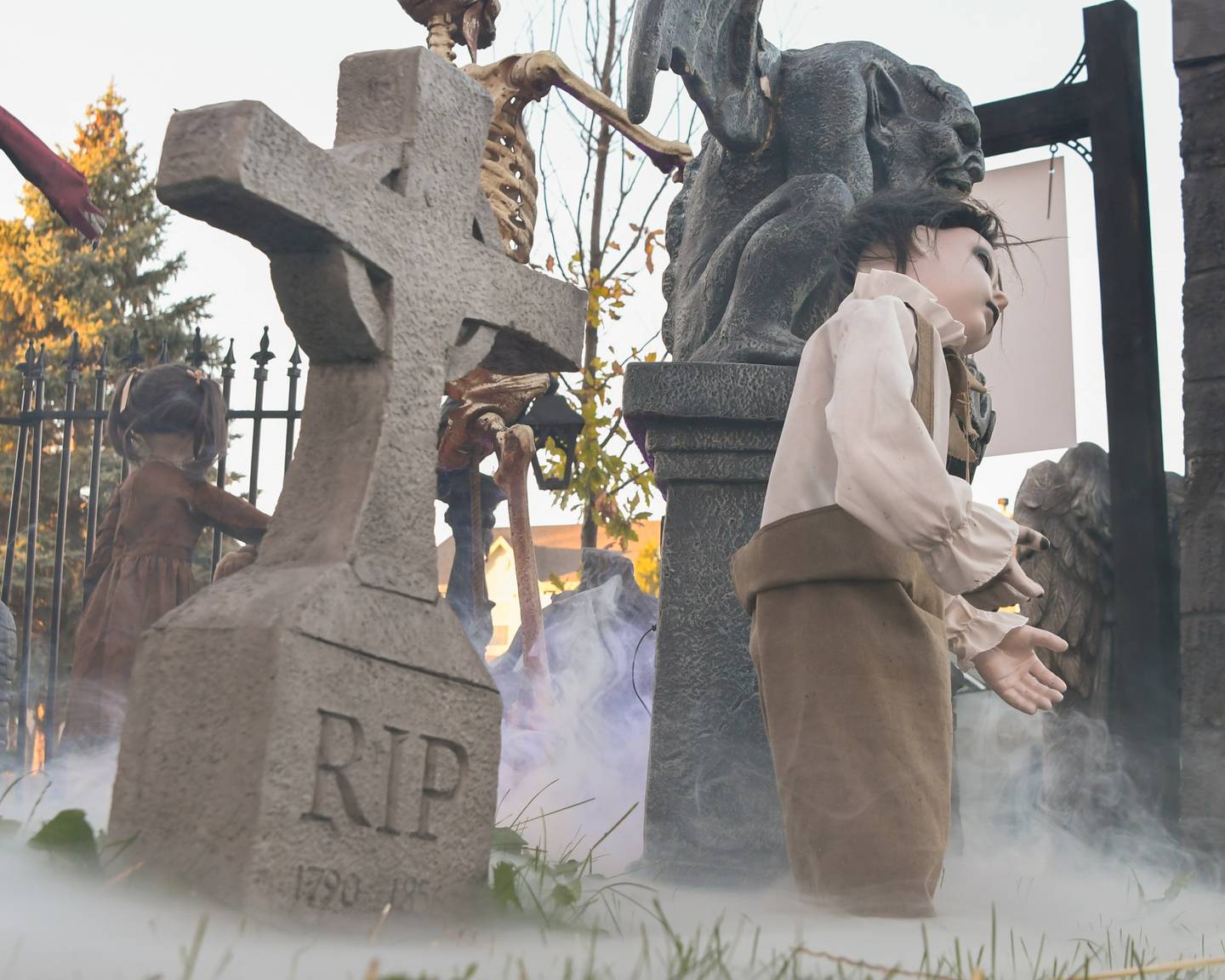 Phil and Dannielle Dienoff use fog as part of their haunted yard trail display on Wednesday Oct. 16, 2024, held at their home in Oswego.