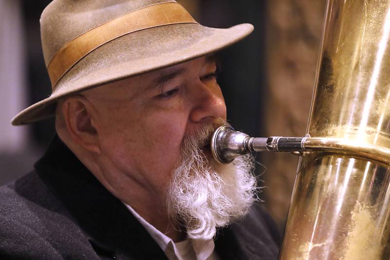 Steve Hart of Die Musik Meisters plays the tuba as he entertain the crowd Friday, Feb. 2, 2024, during the annual Groundhog Day Prognostication on the Woodstock Square.
