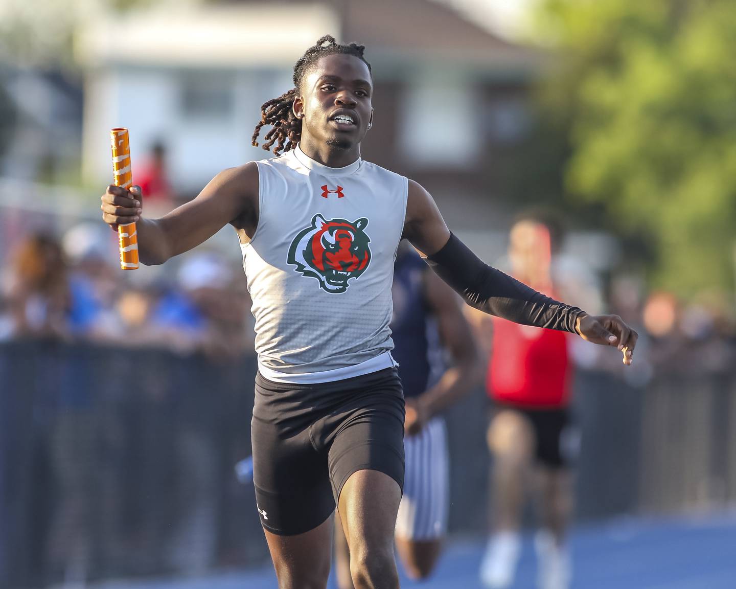 Plainfield East's Joe Owusu anchors Plainfield East to victory in their 4x100m during Southwest Prairie Conference Boys Track and Field Meet Wednesday, May 14, 2025 in Joliet.