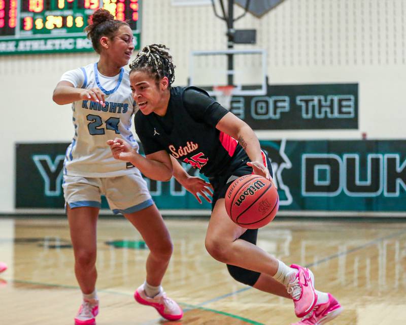 St Charles East's Corinne Reed (35) drives baseline at the York Thanksgiving Tournament. Nov 13, 2023.