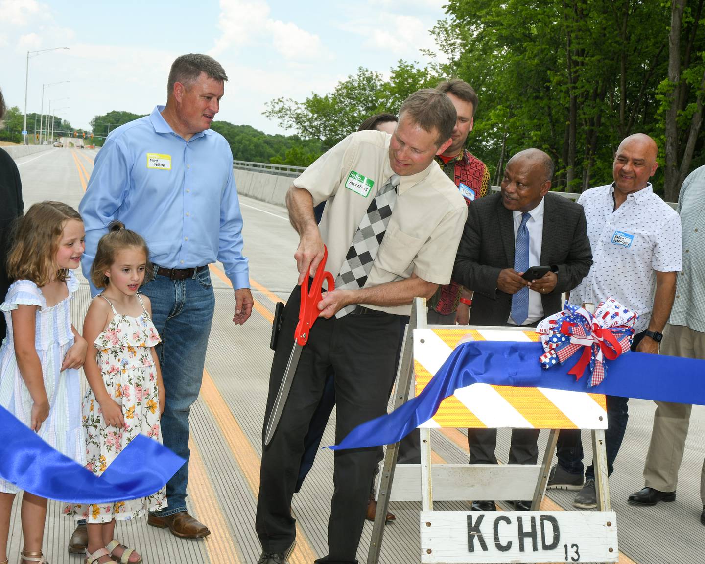 Fran Klass cuts the ribbon  during the grand opening of the Fran Klaas Bridge on Wednesday May 31st 2023 that crosses over the Fox River on Eldamain Road between Plano and Yorkville.