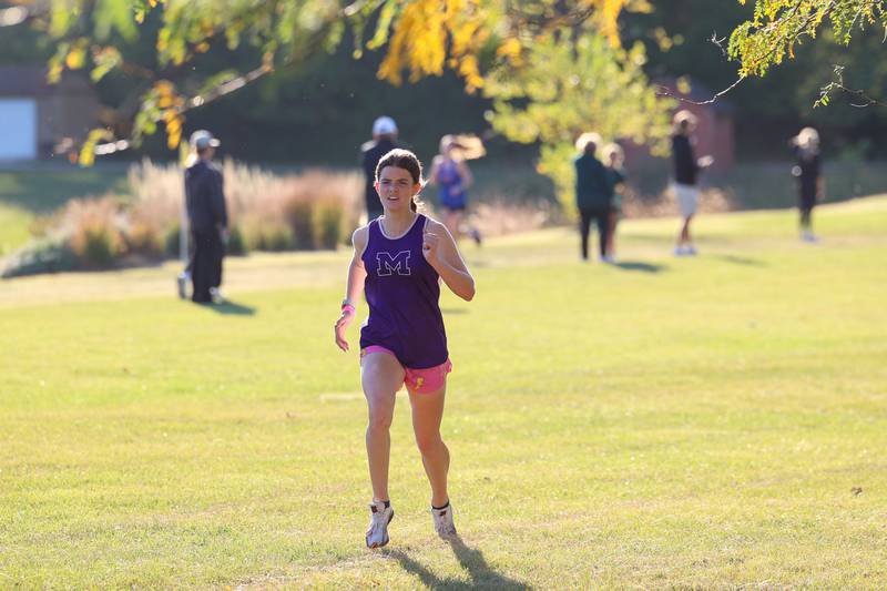 Manteno's Olivia Zwirkoski nears the finish line in 10th place in the girls 3-mile race during All-Area Cross Country meet on Wednesday, Oct. 8, 2025, at Kankakee Community College.
