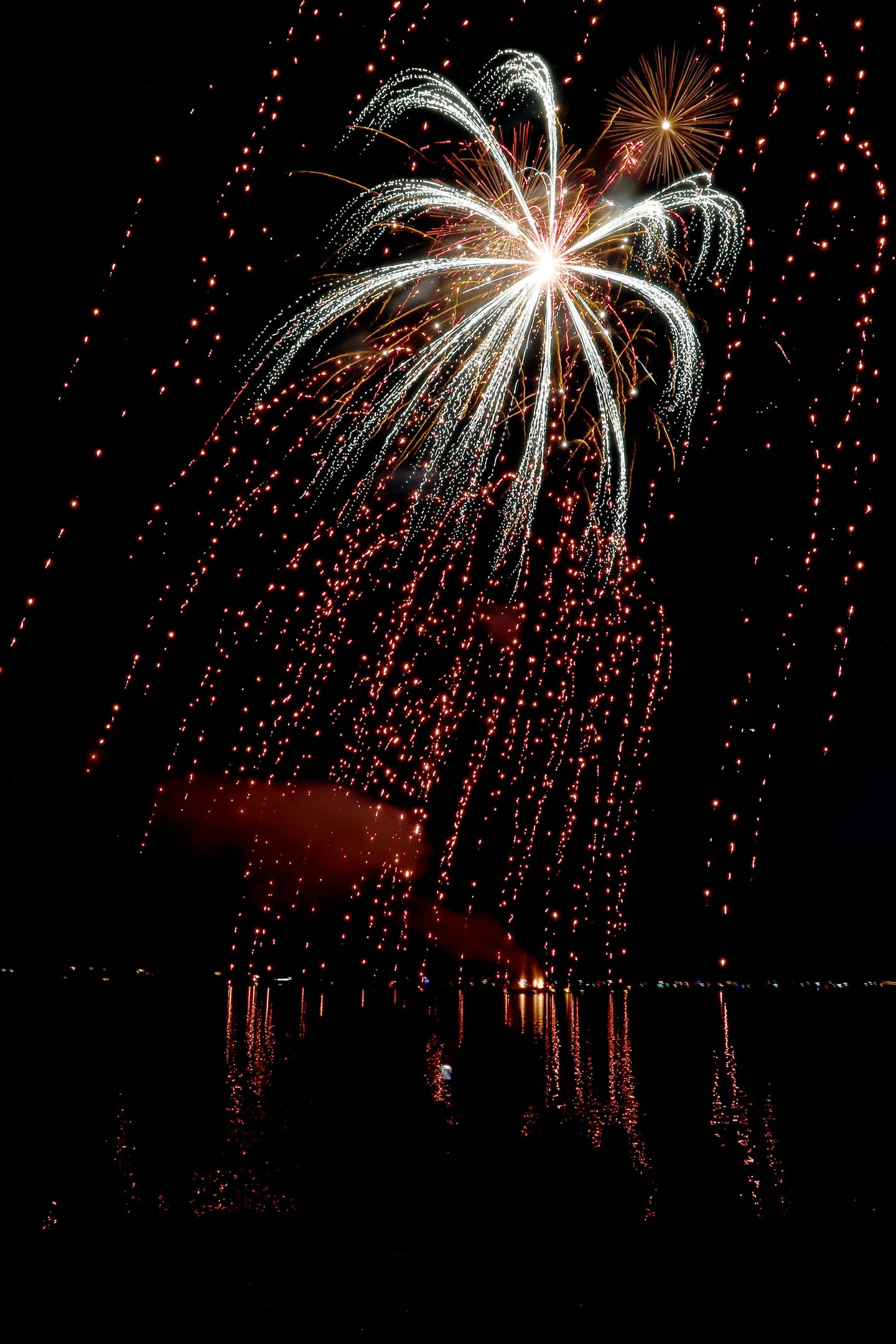 Fireworks dazzle the sky above Crystal Lake on Sunday, July 2, 2023, at Crystal Lake’s Main Beach during Crystal Lake Annual Independence Day Celebration.