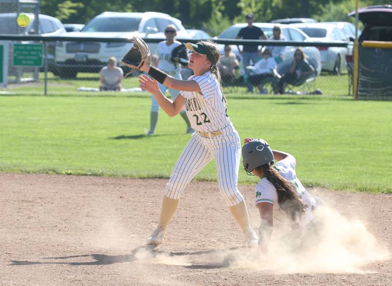 Senca's Aurora Weber slides safely into second base as the late throw come into St. Bede's Ella Hermes on Tuesday, May 7, 2024 at St. Bede Academy.