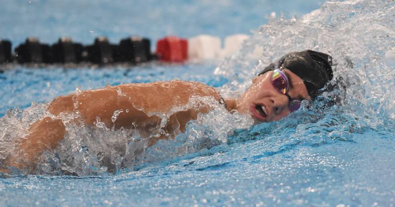 Hinsdale Central’s Burlingtyn Bokos swims the 500-yard freestyle during the IHSA girls state swimming finals at FMC Natatorium in Westmont on Saturday, Nov. 12, 2022.