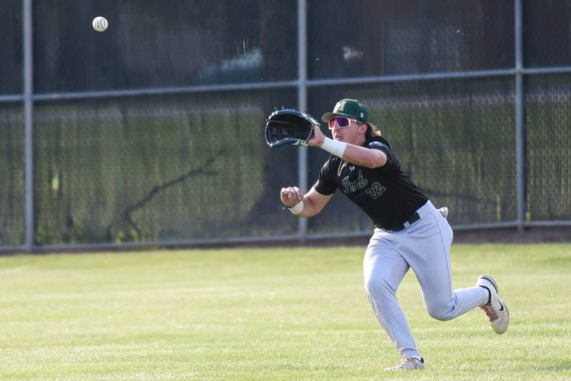 Bishop McNamara's Dom Panozzo catches a fly ball during the Class 2A Beecher Sectional semifinals against Manteno Thursday, May 29, 2025.