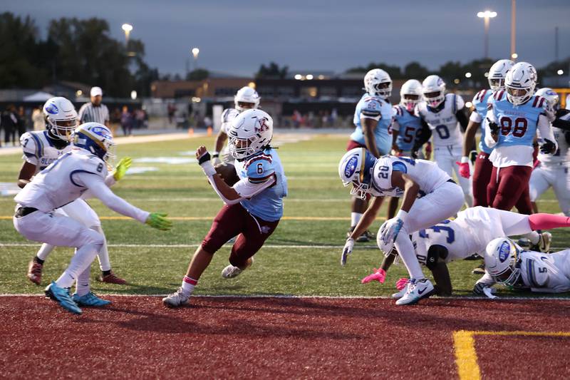 Kankakee's Zayden Henley runs in a touchdown during the Kay's victory over Bloom on Friday, Oct. 10, 2025.