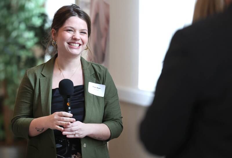 Megan Meyer, of MC Beauty, smiles as her business receives the Community Diamond Award during the 107th Annual Sycamore Chamber of Commerce Meeting Thursday, March 7, 2023, in Memorial Hall at St. Mary's Catholic Church in Sycamore.