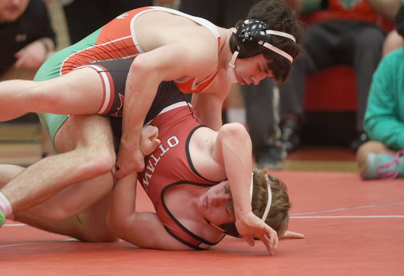L-P's Rylynd Rynkewicz, wrestles Ottawa's Jerome Bridwell, during a meet on Thursday Jan. 8, 2026 in Kingman Gymnasium at Ottawa High School.
