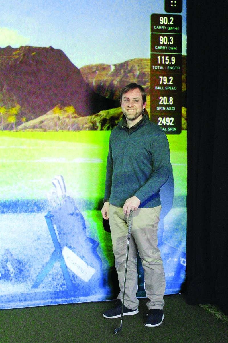 Nathan Studtmann of First Galena Corporation's Golf Performance Studios in Galena designs golf simulation setups that help golfers improve on skill and enjoy a virtual round of golf if they can't get away from home.