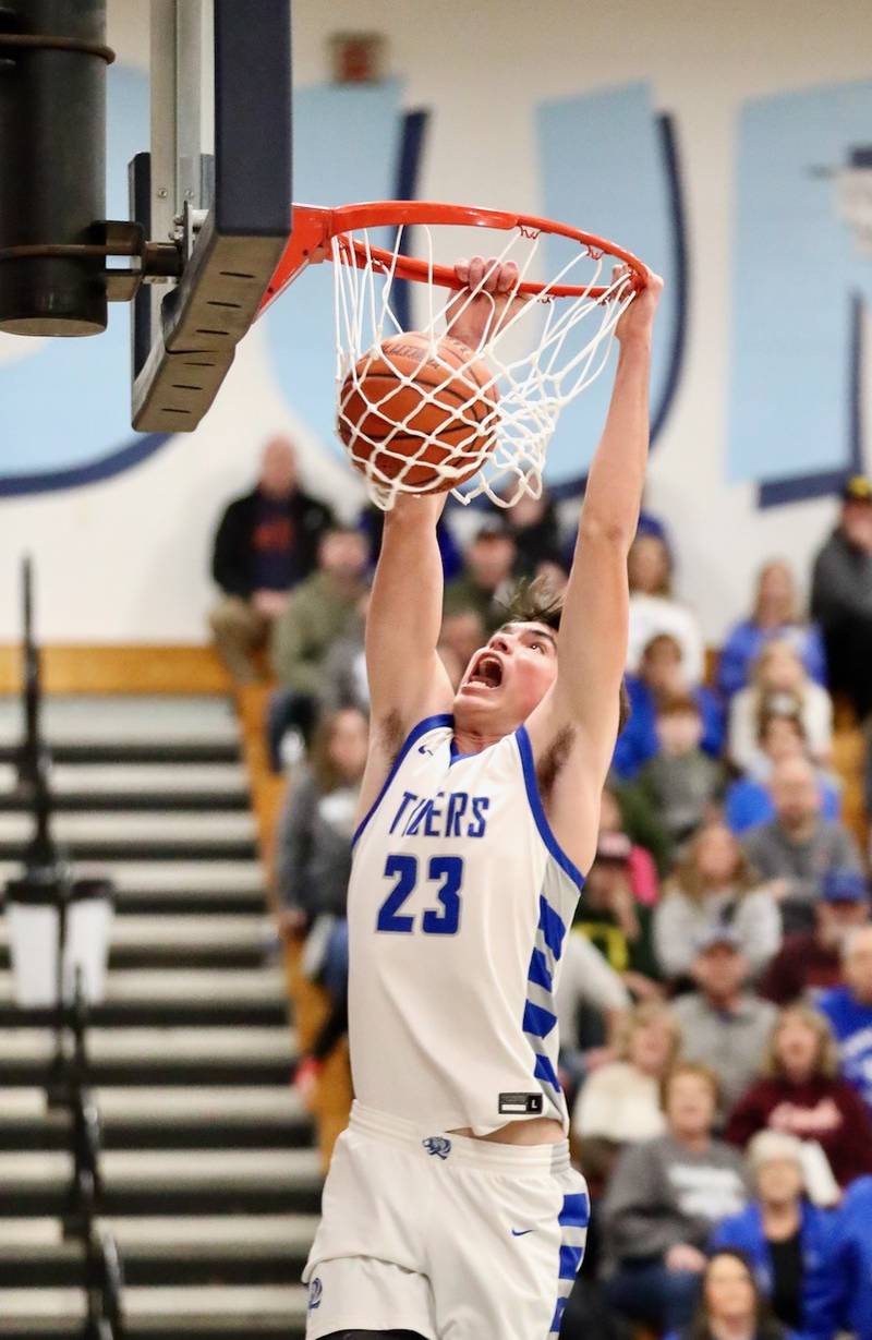 Princeton's Noah LaPorte throws down a first-half dunk in Thursday's regional semifinals against Hall at the Storm Cellar. Princeton won 88-43.