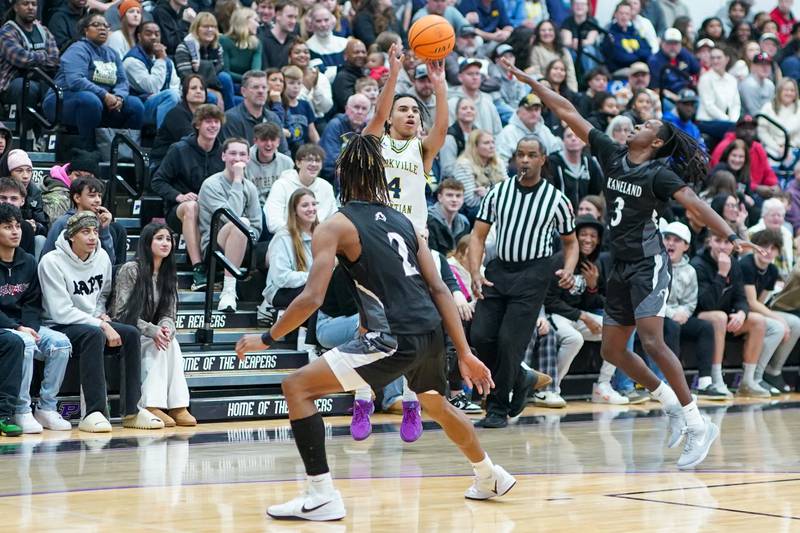 Yorkville Christian's Tray Alford (4) shoots a three pointer against Kaneland during a championship final basketball game in the 61st annual Plano Christmas Classic at Plano High School on Saturday, December 28, 2024.