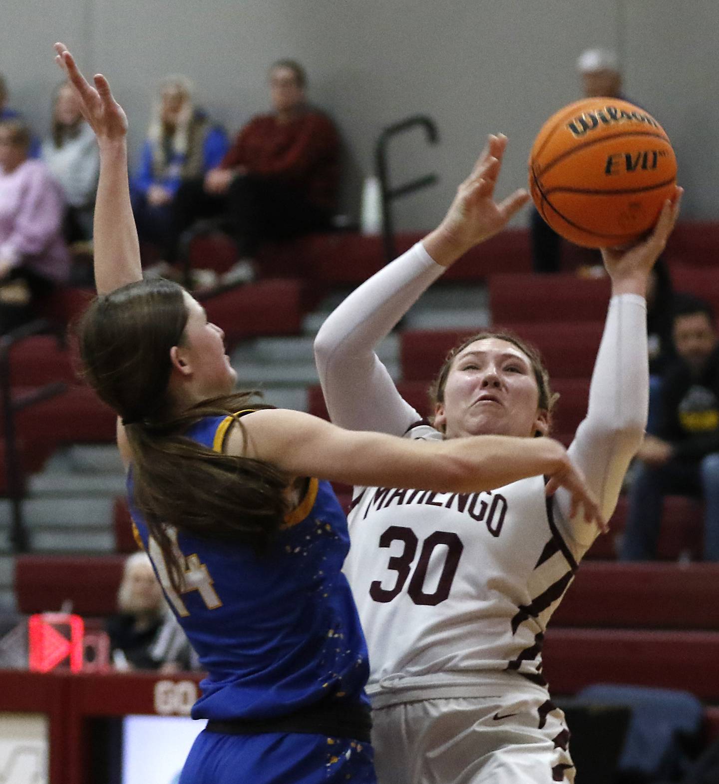 Marengo's Macy Noe shoots the ball over Johnsburg's Summer Toussaint during a Kishwaukee River Conference basketball game on Saturday, Feb. 1, 2025, at Marengo High School.