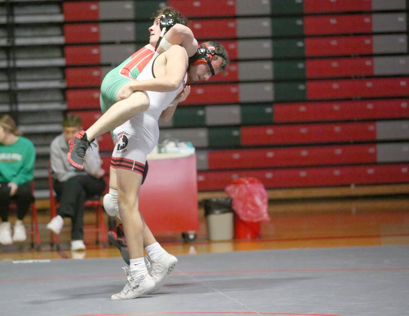 Ottawa's Doug Sibert picks up L-P's Tyler Witczak on Thursday, Jan. 9, 2025 in Sellett Gymnasium at L-P High School.