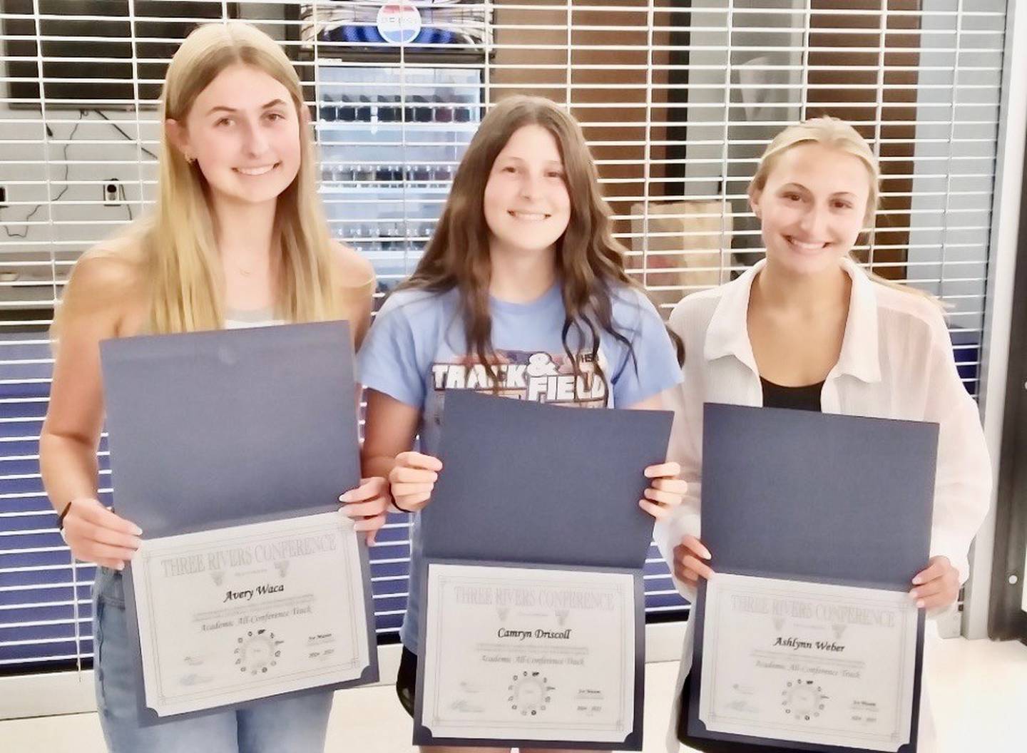 Academic All-Conference Award winners for the 2025 Princeton girls track & field season were Avery Waca (left), Camryn Driscoll and Ashlynn Webber.