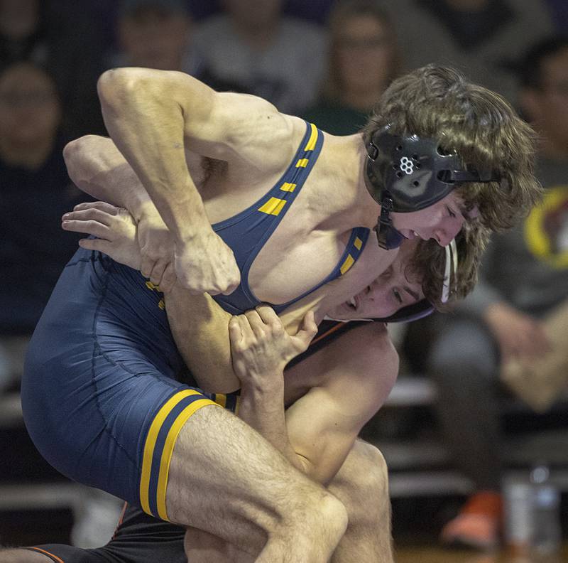 Sterling’s Jonah Tyne works against Freeport’s Thomas Olson Tuesday, Jan. 13, 2025, in a triangular meet at Dixon High School.