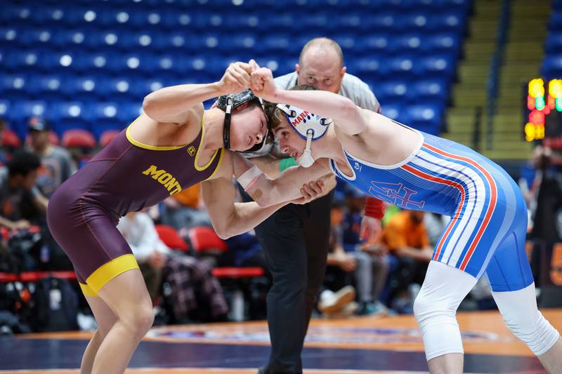 Marmion Academy's Brody Page, right, wrestles Montini's Allen Woo in the 120-pound match during Marmion Academy's victory over Montini in the IHSA Class 3A Dual Team State championship on Saturday, Feb. 28, 2026.