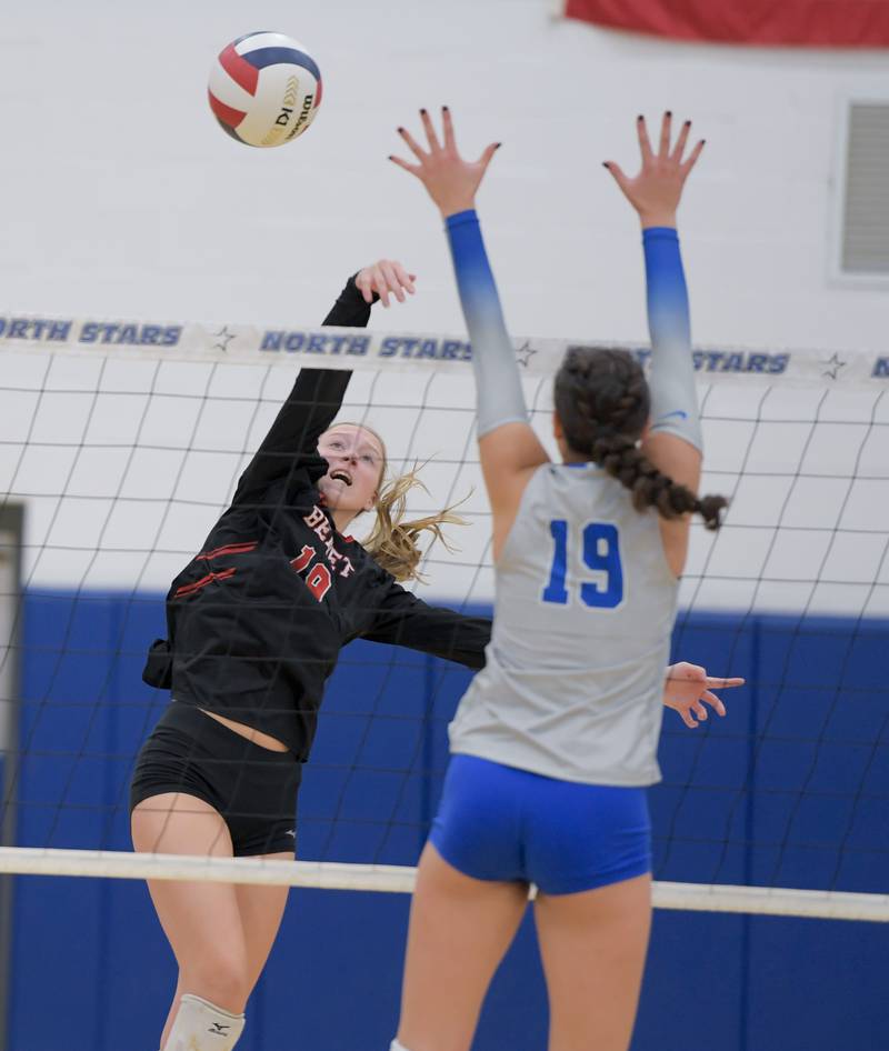 Benet’s Valerie Sarros (19) hits the ball past St. Charles North's Alex Bardouniotis (19) during a game on Wednesday, September 20, 2023.