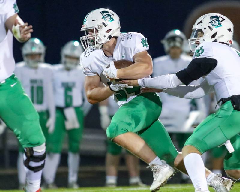 York's Jimmy Connors takes the handoff during Class 8A second- round football game between York at Oswego on Friday, Nov 8, 2024  in Oswego.