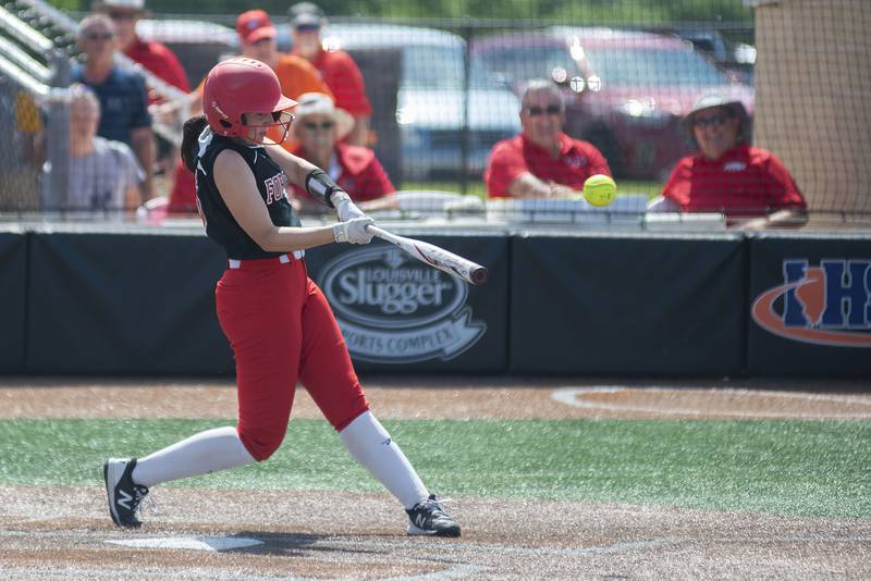 Forreston’s Hailey Greenfield drives in a run to put the Cardinals up by two against Newark Saturday, June 4, 2022 during the IHSA Class 1A softball state third place game.