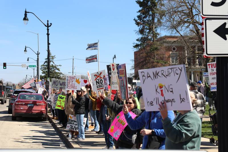 Protesters participate in the No Kings rally at the Kankakee County Courthouse on March 28, 2026.
