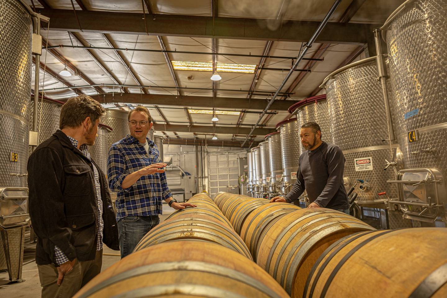 Avivo owner and director of winemaking Dan Fitzgerald (center) with production team. (2025 submission)
