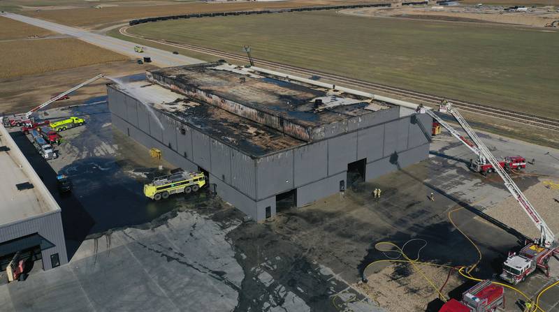 Firefighters work the scene of a structure fire on Wednesday, Oct. 8, 2025 at Marquis Energy in Hennepin. The fire was upgraded to a 5th alarm dispatching the (MABAS) Mutual Aid Box Alarm System. The fire broke out around 11a.m.