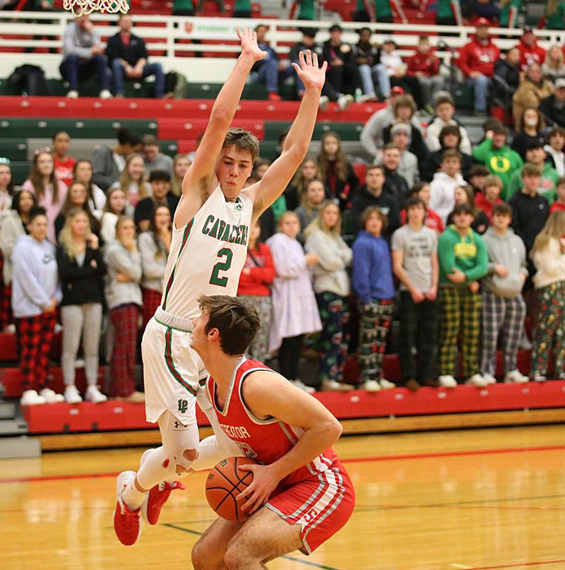 Streator's Christian Benning fakes a shot as L-P's Seth Adams defends on Thursday, Jan. 28, 2023 at L-P High School.