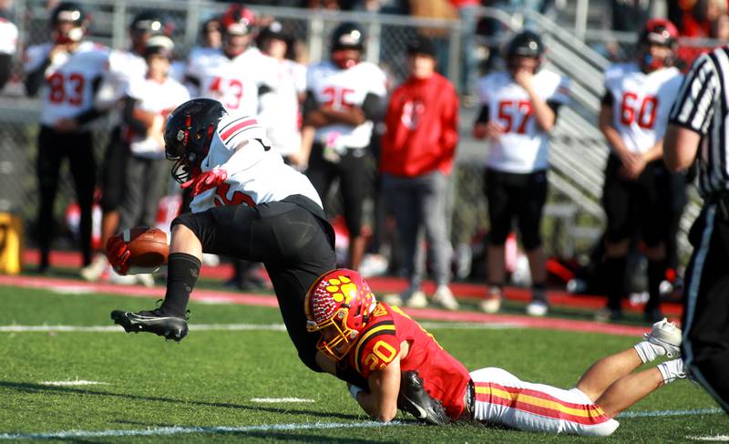 Batavia’s Chase Osborne takes down Lincoln-Way Central’s Tyler Tulk during the Class 7A second round playoff game against in Batavia on Saturday, Nov. 4, 2023.