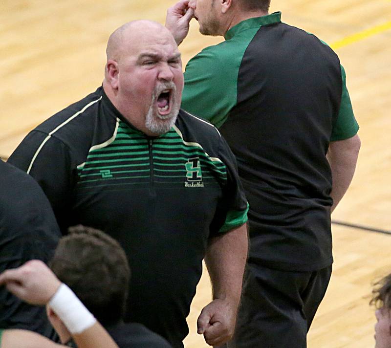 Seneca head boys basketball coach Russell Witte reacts after pulling ahead of Putnam County in the third quarter on Friday, Dec. 16, 2022 at Putnam County High School.