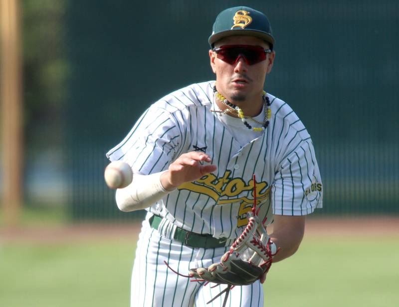 Crystal Lake South’s Yandel Ramirez fields in infield shot against Lake Forest in Class 3A baseball regional action at Crystal Lake Thursday.