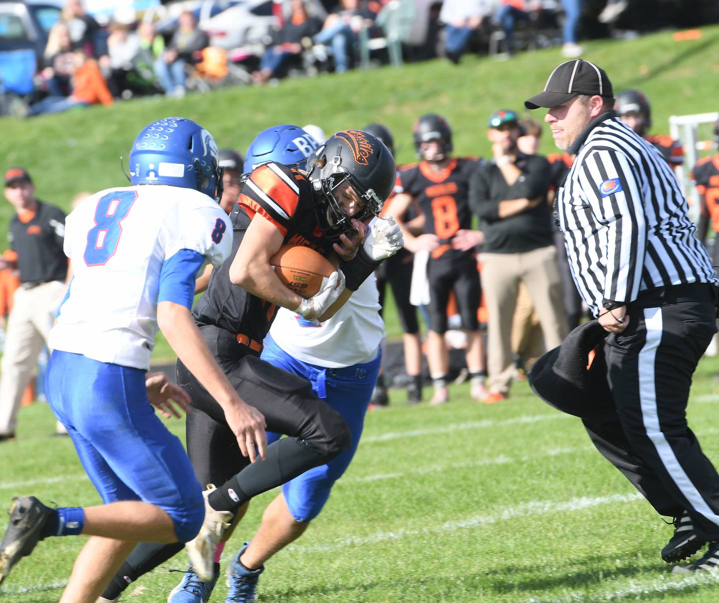 Milledgeville's Bryce Aude runs for a gain.