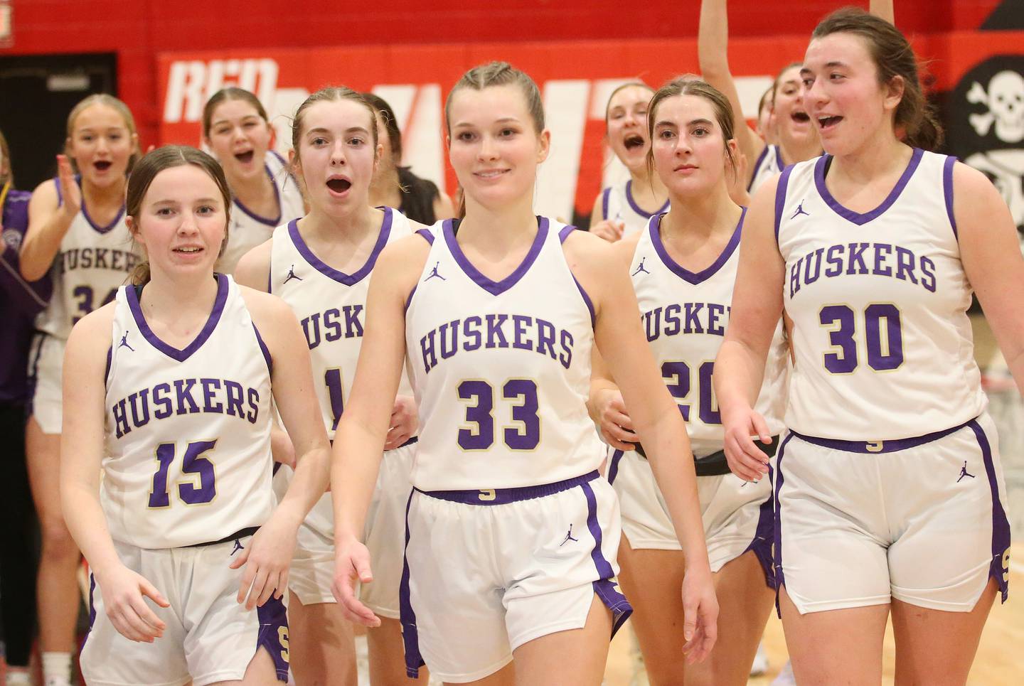 Senera Lady Huskers (from left) Hannah McNelis, Macy Mahler, Jenna Setchell, RayElle Brennan and Maddie Glade react winning the Little Ten Conference championship game over Hinckley-Big Rock on Friday, Jan. 24, 2025 at Earlville High School.