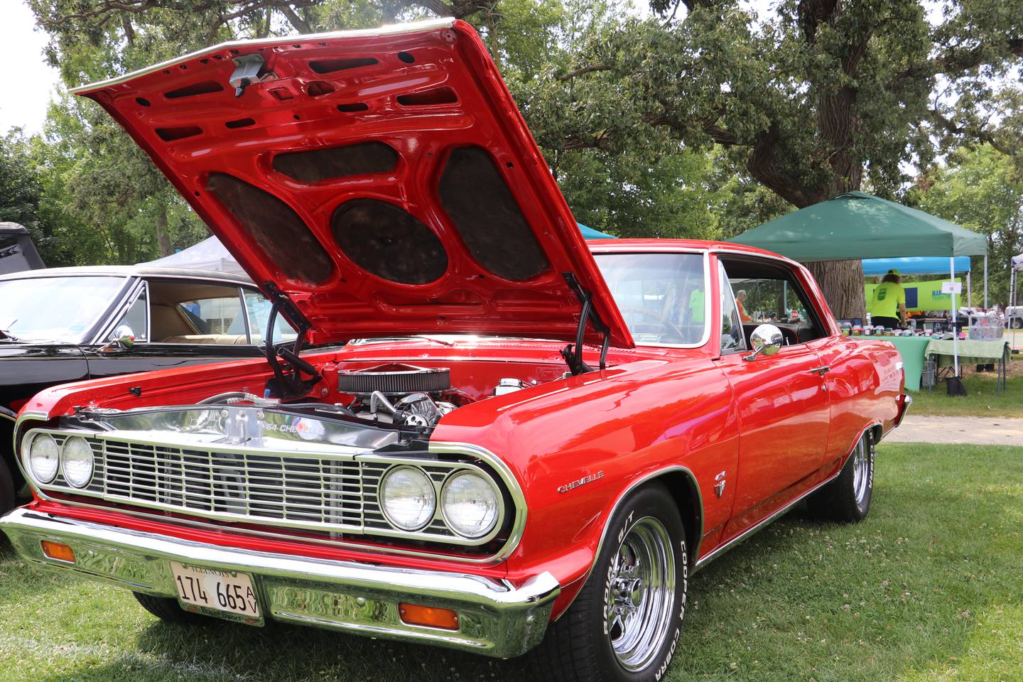 On Sunday, there was a little rain on the parade, but the Gurnee Days traditions continued with Gurnee’s Farmer Market and Car Show. Presented by North Shore Rods Inc. and McClure’s Garage, nearly 300 cars drove into Viking Park.