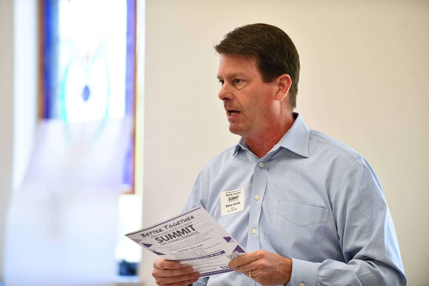 Kankakee Mayor Chris Curtis speaks Thursday during Fortitude Community Outreach's Better Together 2023 Kankakee County Summit on Homelessness. 
Curtis shared the five ordinances granted in the city of Kankakee in the past two years for homelessness services, including Gift of God's reopened shelter, the Victory House halfway house, Fortitude's temporary site permits, We Stand for Jesus Christ Ministries halfway house and the planned Kankakee County Housing Authority's homeless veterans' residence. Curtis beckoned other communities to step up.