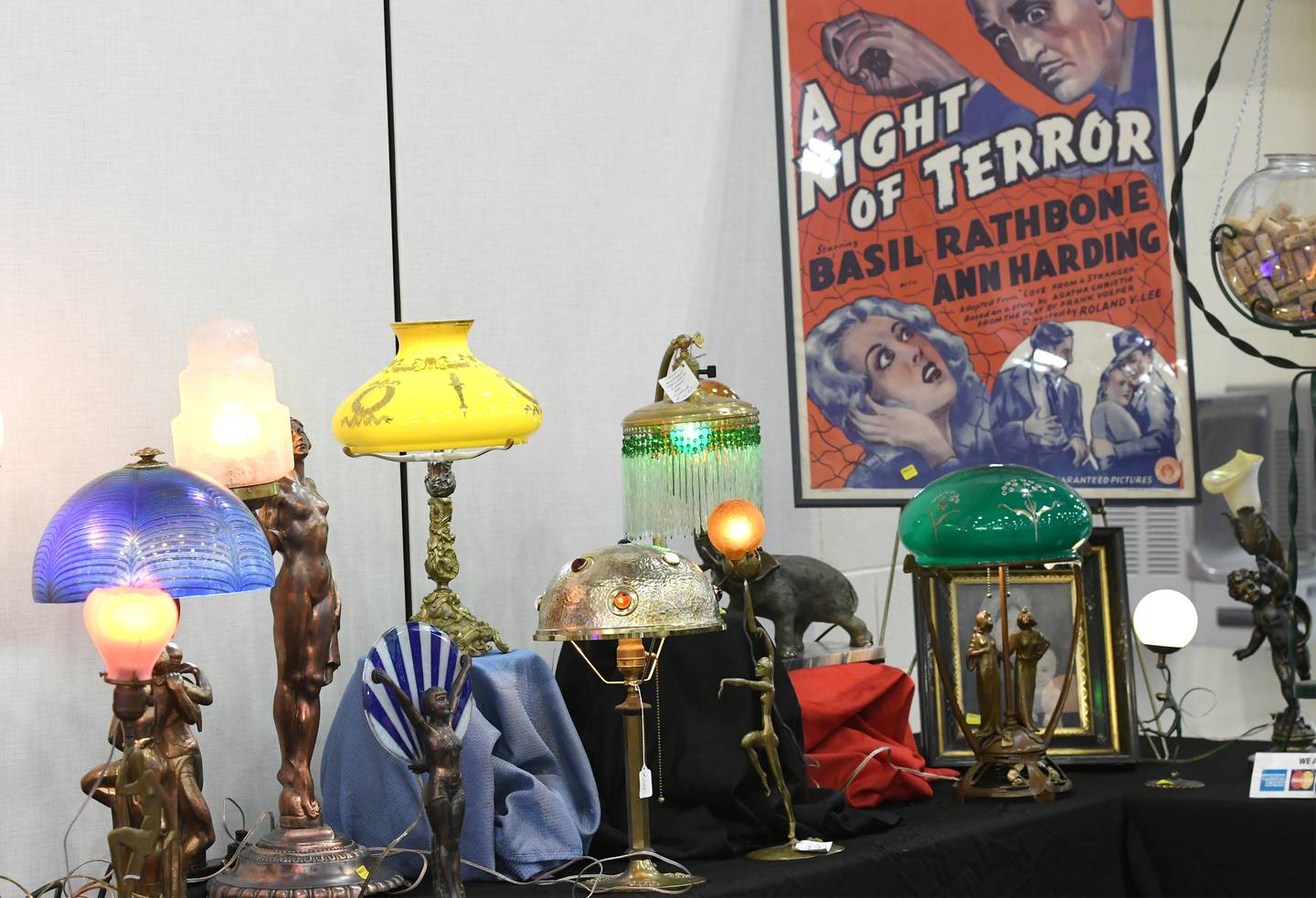 The 'Twisted Whiskers" booth at the Oregon Woman's Club Antique Show featured a selection of art deco and art nouveau lamps. The shop is located in Raymond, Illinois near Springfield.