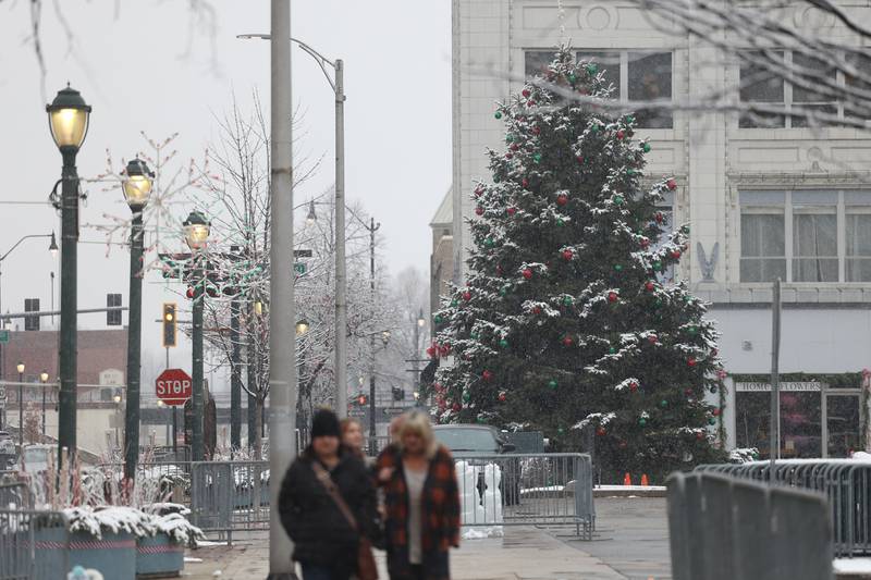 The Joliet Christmas tree gets a snowing of snow in downtown Joliet on Sunday, Nov. 26, 2023.