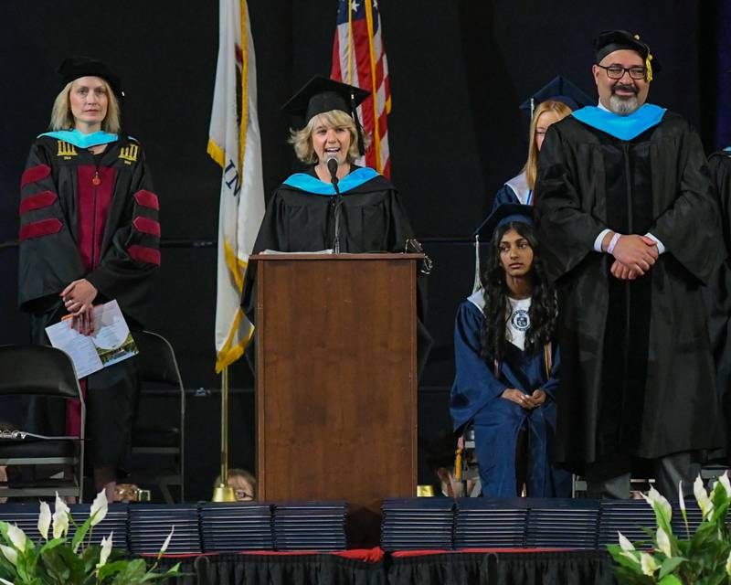 Oswego East’s principal Mrs. Laura Bankowski speaks during the graduation commencement ceremony on Saturday May 17, 2025, held at the Convocation Center in DeKalb.