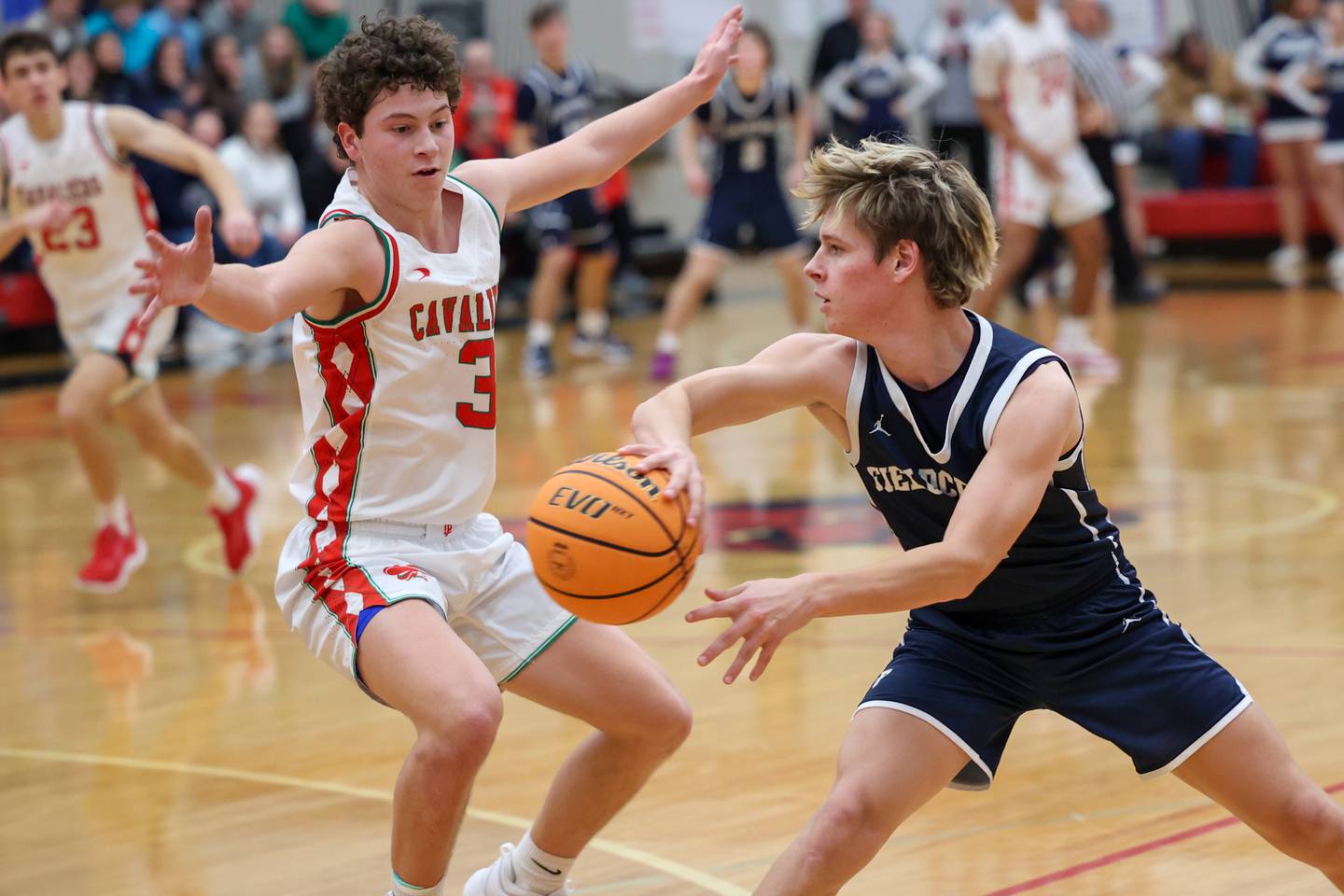 Eli Gerdes of Fieldcrest passes ball on Saturday, December 14, 2024 at Hall High School in Spring Valley.