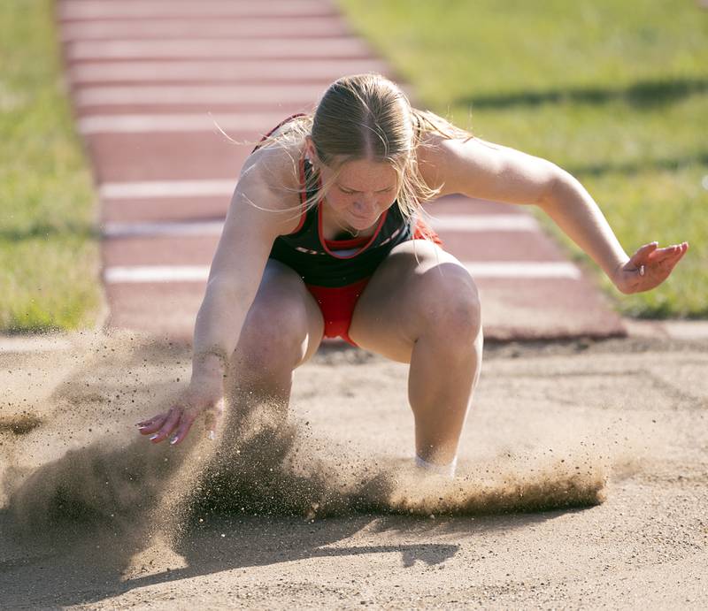 Fulton’s Haley Smither lands her triple jump Wednesday, May 13, 2026, during the Class 1A Erie Sectional meet.