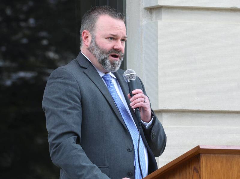 DeKalb County State’s Attorney Riley Oncken speaks Wednesday, April 29, 2026, during Hands Around the Courthouse at the DeKalb County Courthouse in Sycamore. The event was held to mark Child Abuse Prevention Month.