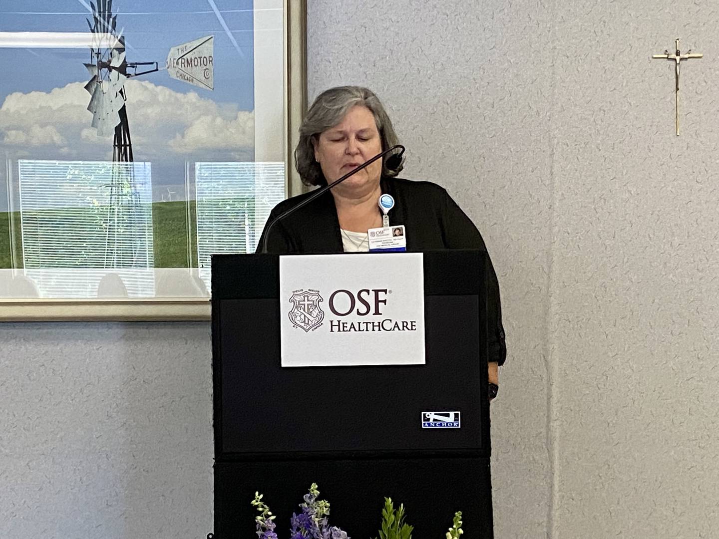 Dr. Cathy Ruetten, a longtime family medicine physician, gives remarks during a dedication ceremony at what was formerly Edward-Elmhurst Health’s Sycamore Family Practice, 954 W. State St. in Sycamore on Tuesday, Oct. 3, 2023. OSF HealthCare recently purchased  the clinic.